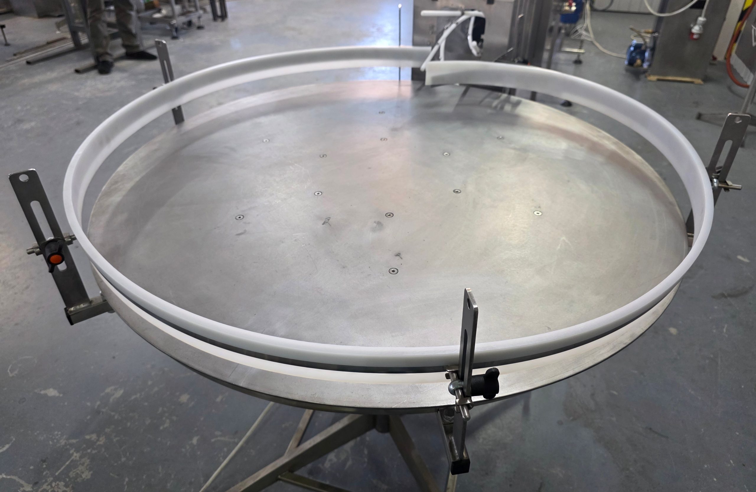 Поворотний подаючий стіл (накопичувач) для тари